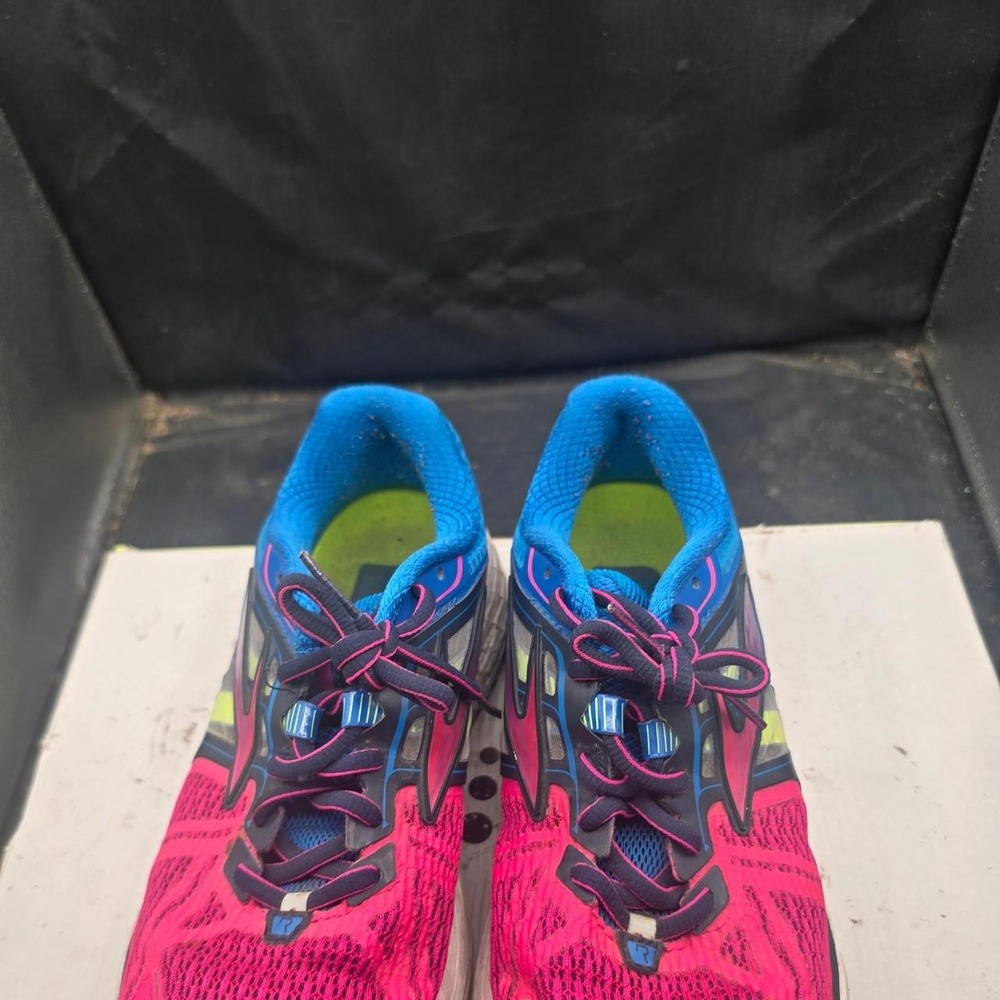 Brooks Ravena 6 running shoes in pink, blue, and green